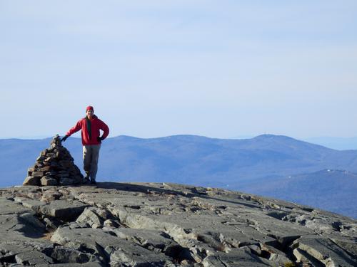 hiker on the sub peak of Mount Kearsarge in New Hampshire