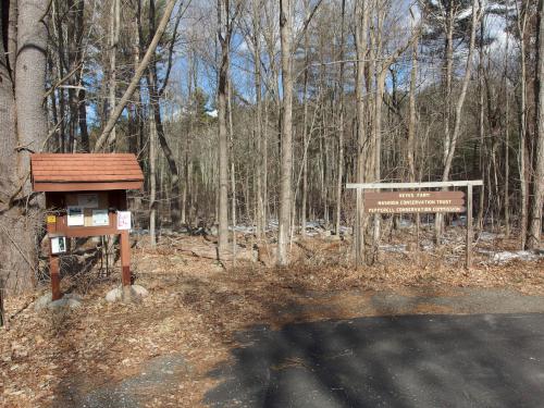 trail sign and kiosk at the entrance to Keyes Farm in Pepperell, MA