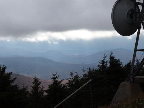 sinister view beneath cloudy weather from the summit of Pico Peak in Vermont