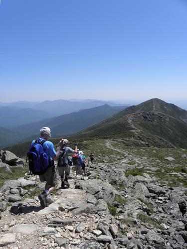 hikers head across Franconia Ridge toward Mount Lincoln in New Hampshire