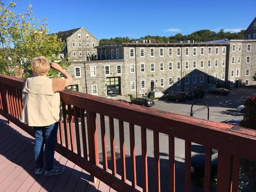 Andee checks out the beautifully restored historic buildings at Newmarket on the Lamprey River Tour in southeastern New Hampshire