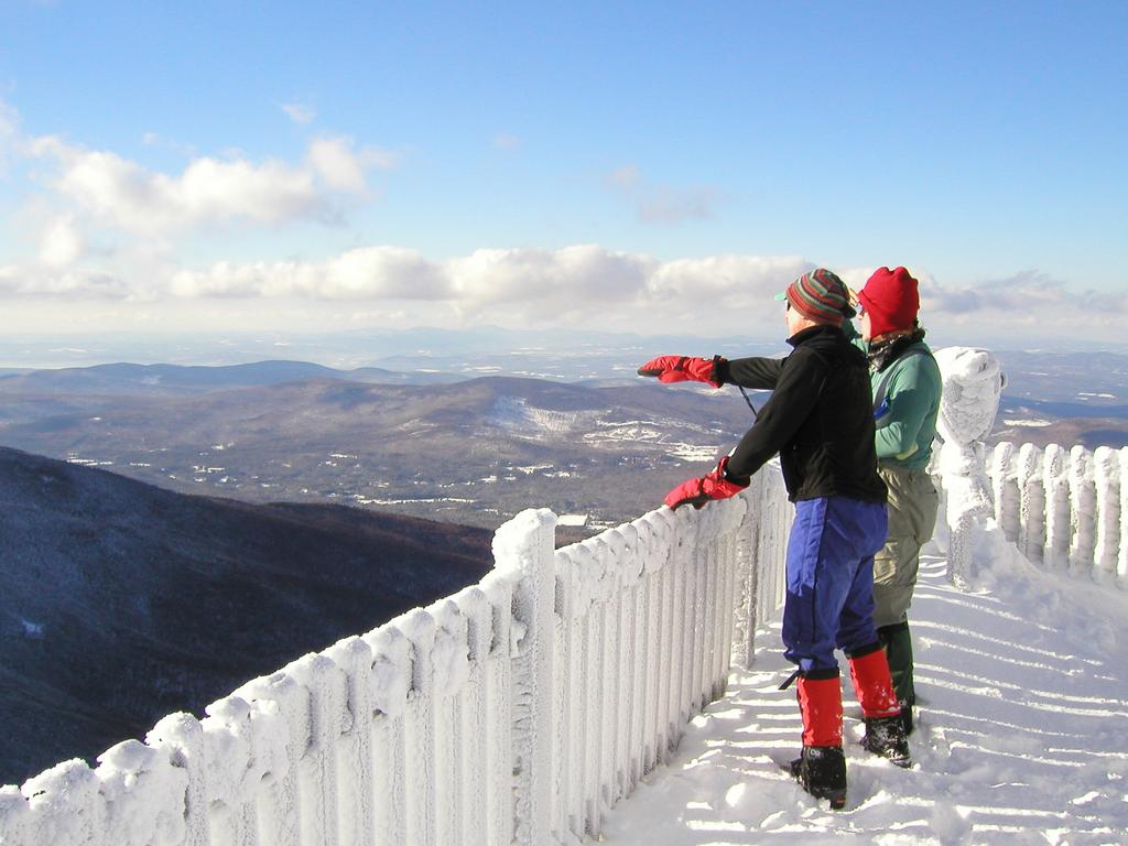 winter hikers on the observation tower on Cannon Mountain in New Hampshire