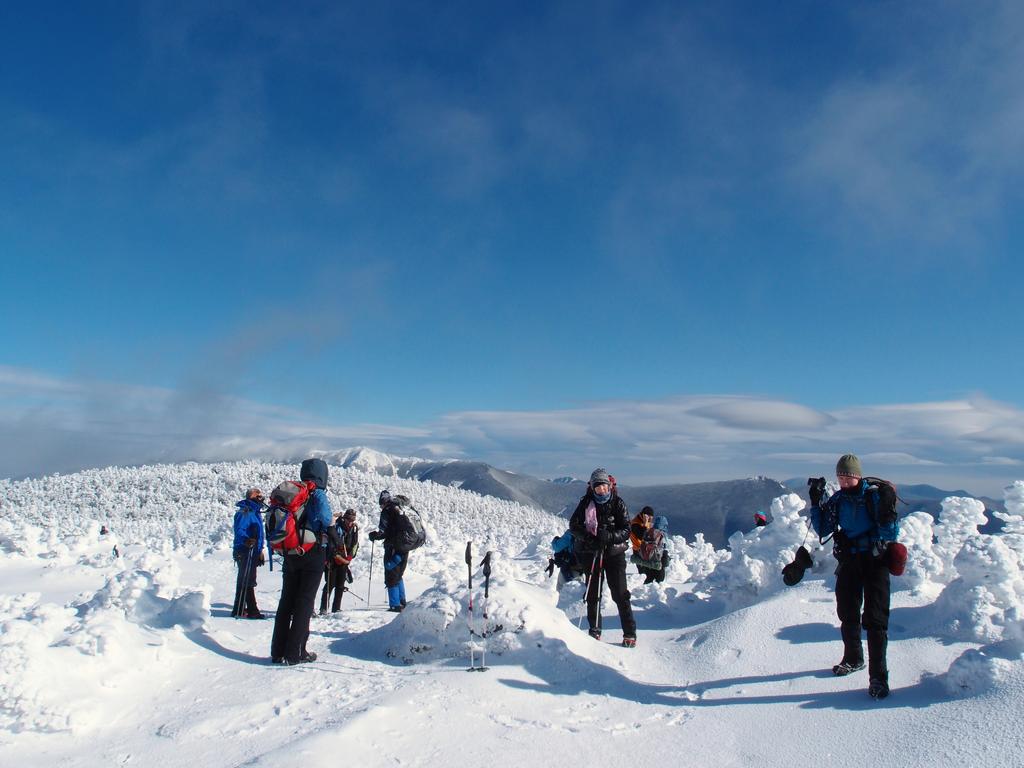 winter hikers on South Kinsman Mountain in New Hampshire