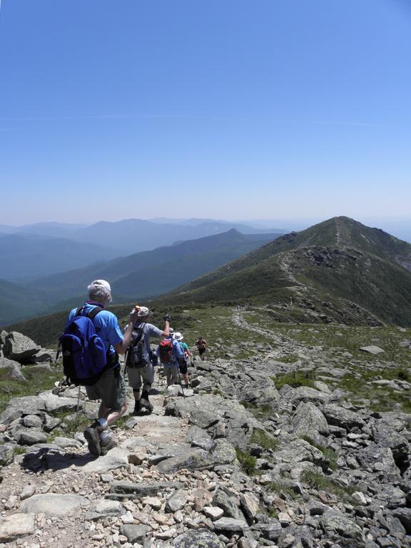 hikers head across Franconia Ridge toward Mount Lincoln in New Hampshire