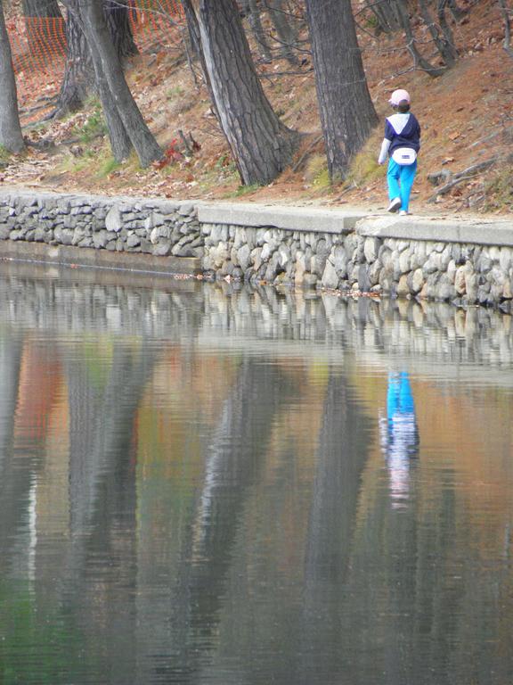 young hiker at Walden Pond State Reservation in Massachusetts