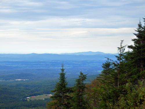 view toward the Adirondacks from The Great Cliff of Mount Horrid in Vermont