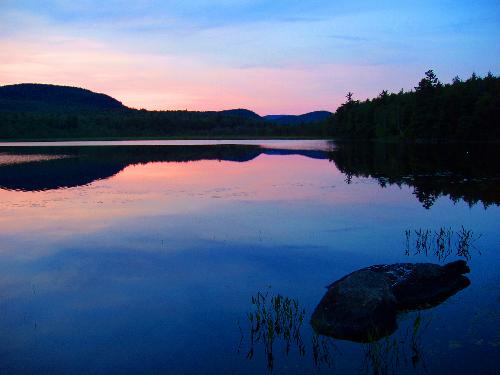 sunset over Halfmoon Pond near Lovewell Mountain in New Hampshire