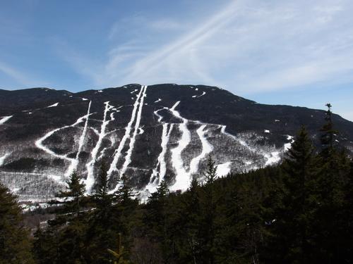 view of Wildcat Ski Area in April from a ledge near Lowe's Bald Spot at Pinkham Notch in New Hampshire