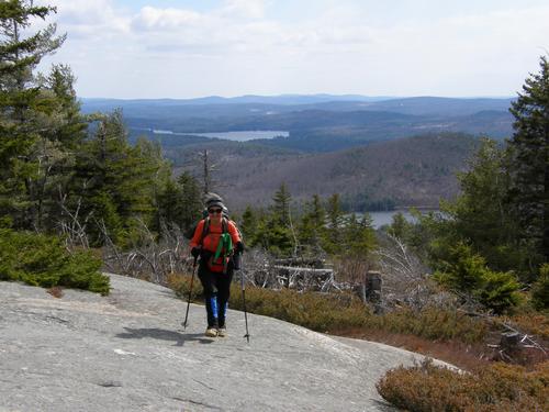 hiker on Mount Anna in New Hampshire