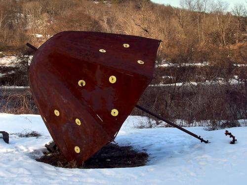 umbrella modern-art sculpture in January at Mascoma River Greenway at Lebanon in western New Hampshire