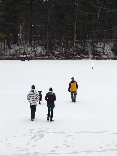 fearless hikers on the ice at Mine Falls Park in New Hampshire