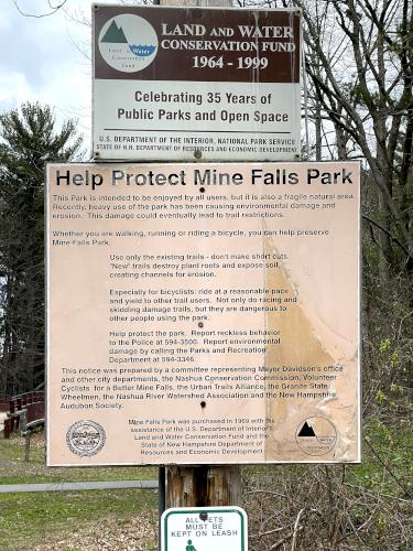 Park protection sign in April at Mine Falls Park in New Hampshire