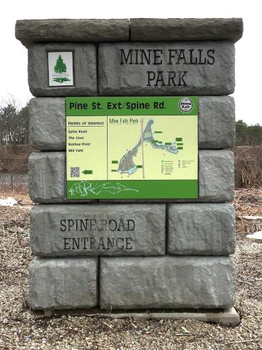 entrance welcome sign in April at Mine Falls Park in New Hampshire