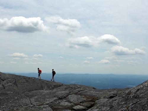 Carl and Sam walk the edge starting down from Mount Monadnock in southern New Hampshire