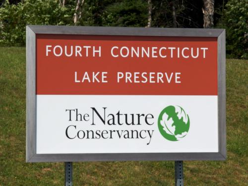 sign at hike-start parking area at Montagne des Lignes in northern New Hampshire
