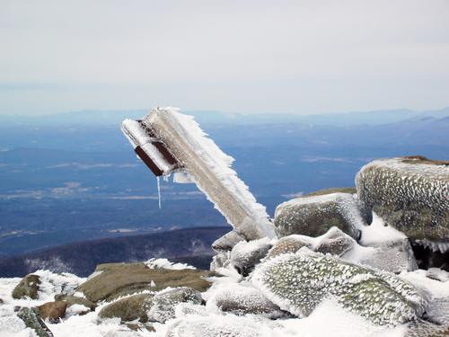 tipped sign and rime ice on the summit of Mount Moosilauke in New Hampshire