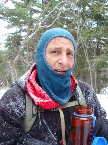 winter hiker on Mount Moriah in New Hampshire