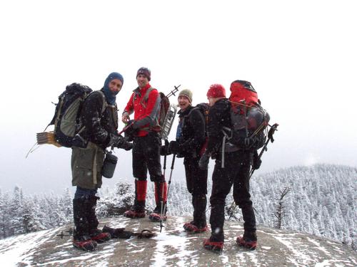 winter hikers atop Mount Moriah in New Hampshire