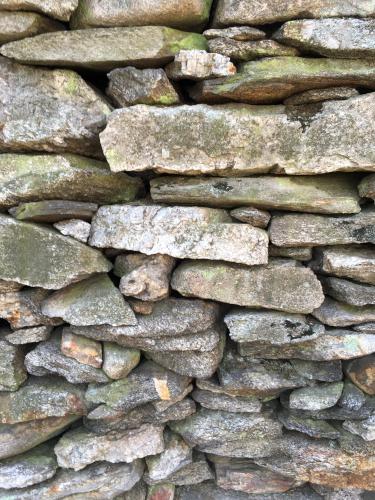 stone wall at America's Stonehenge historical site on Mystery Hill at Salem in New Hampshire