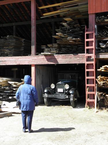 antique car amidst building materials at Mystic Seaport in Connecticut