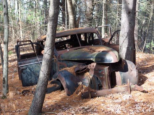 abandoned car at Nashoba Brook Watershed in eastern Massachusetts