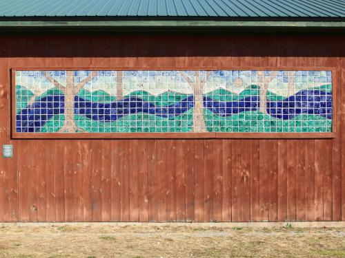 mosaic on the wall of the 4-H Charlie Buck Barn beside the New Boston Rail Trail near New Boston in southern New Hampshire