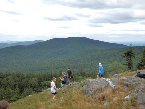 hikers at the view point on North Pack Monadnock Mountain in New Hampshire