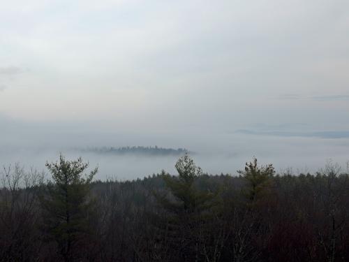 foggy view in December from the Scenic Overlook at Nottingcook Forest near Bow in southern New Hampshire
