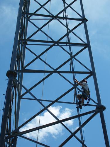 worker on the new communications tower on Oak Hill in New Hampshire