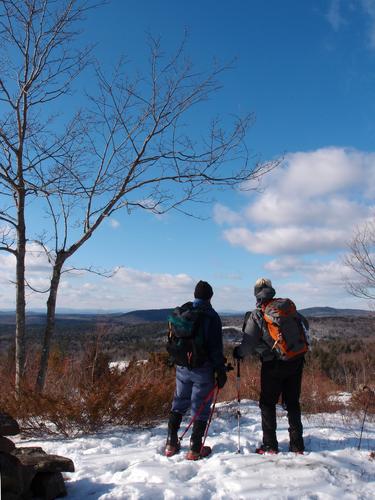 winter hikers on Oak Hill in New Hampshire