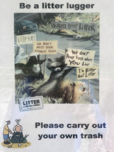 don't-litter poster at October Farm Riverfront near Concord in northeast MA