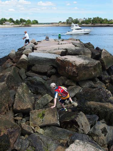 Carl makes his way out onto the tip of the jetty at Odiorne Point State Park in New Hampshire