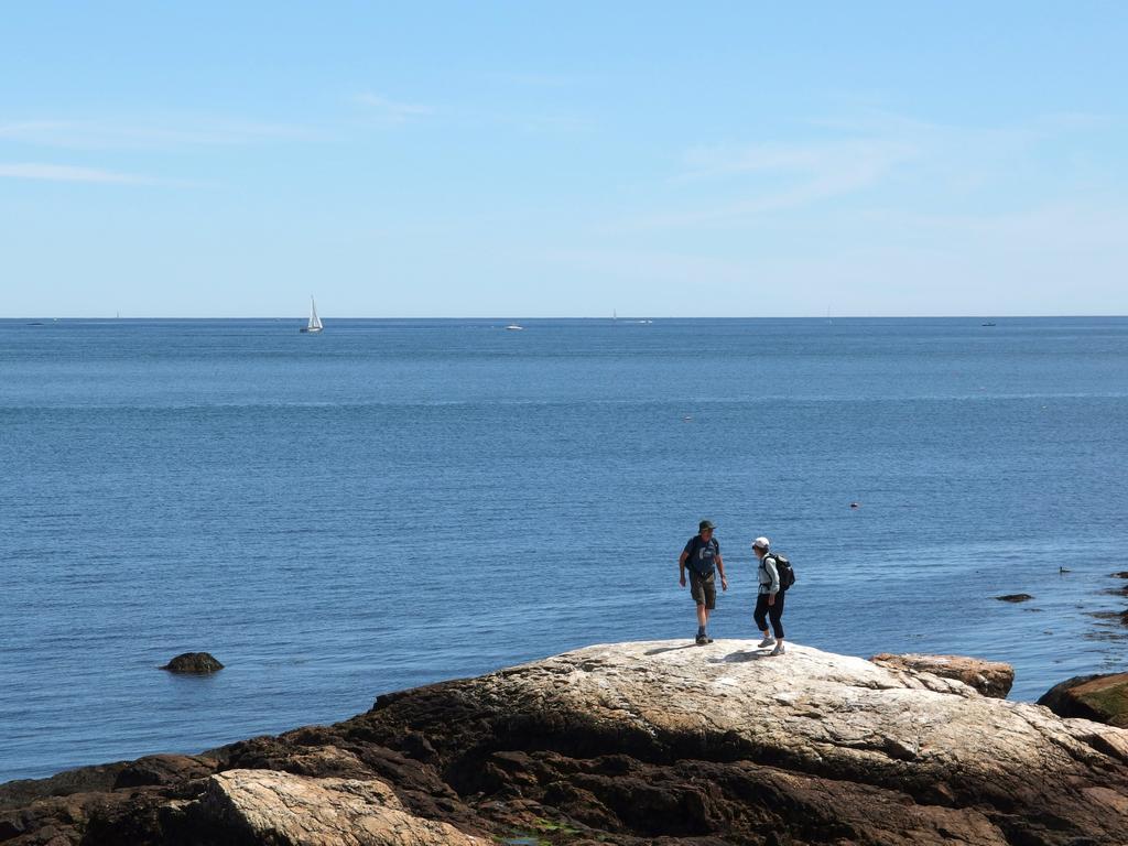 Dick and Elaine stand out on the rocky shoreline at Odiorne Point State Park on the seacoast of New Hampshire