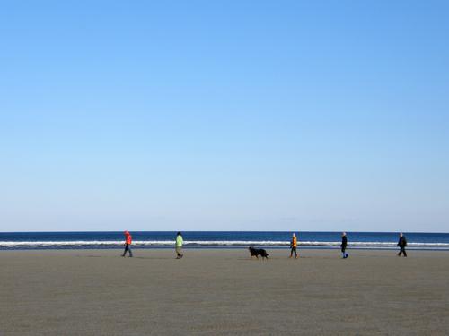 February walkers on Ogunquit Beach in Maine