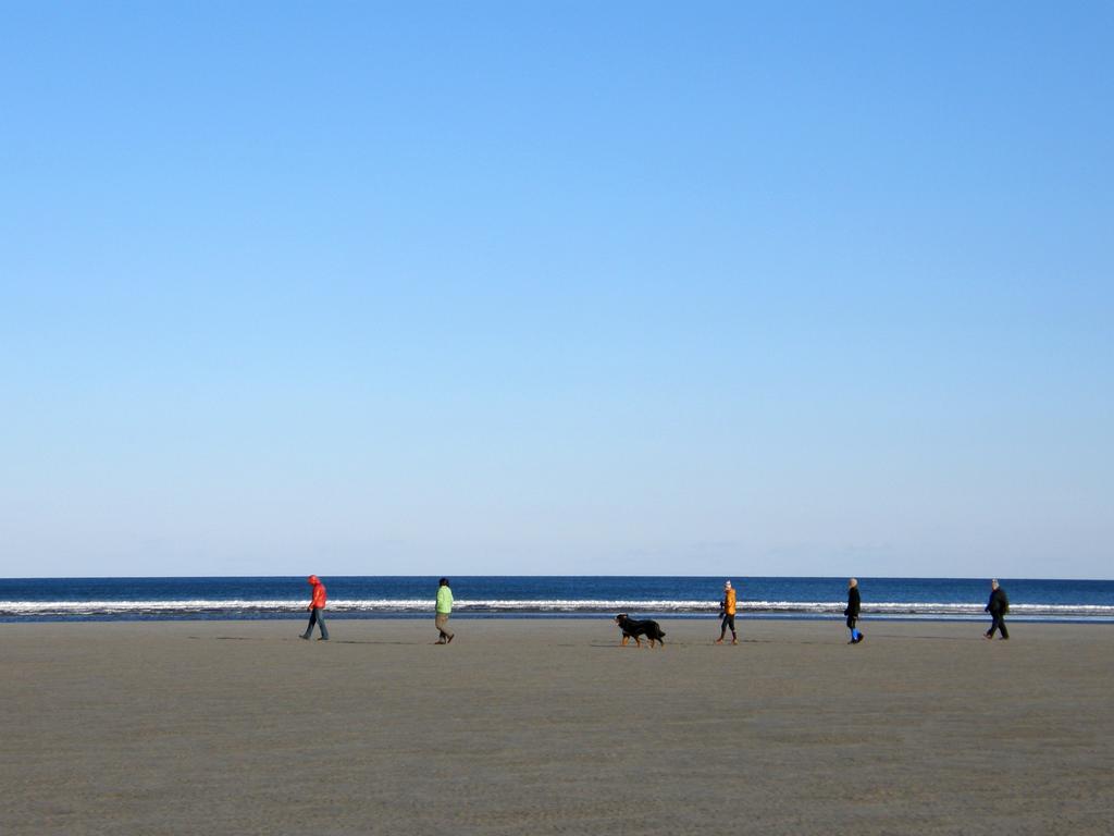 February walkers on Ogunquit Beach in Maine