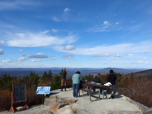 hawk watchers on a beautiful day in October atop Pack Monadnock Mountain in New Hampshire
