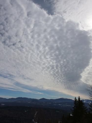 incoming clouds as seen from the lookout on Parker Mountain in northern New Hampshire