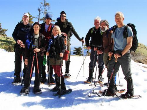 winter hikers on the summit lookout of Mount Whiteface in New Hampshire