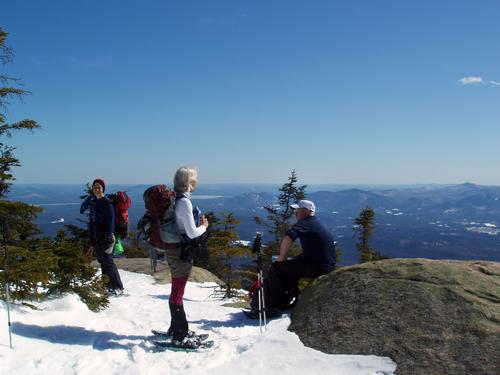 winter hikers on the summit lookout of Mount Whiteface in New Hampshire