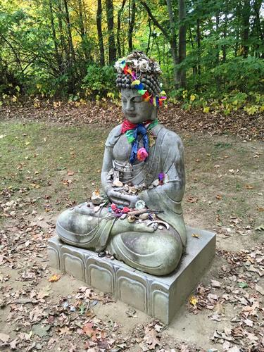 Buddha statue in the Contemplative section at Path of Life Garden at Windsor in eastern Vermont