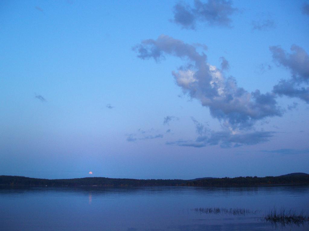full-moon-rise in October over Lake Massabesic in southern New Hampshire