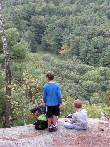 hikers at the overview on Pawtuckaway Middle Mountain in New Hampshire