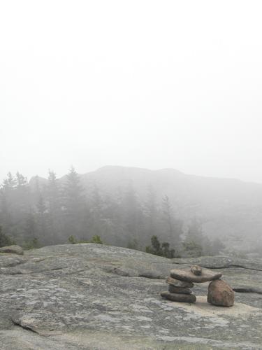 Pemetic Mountain summit in the fog in Maine