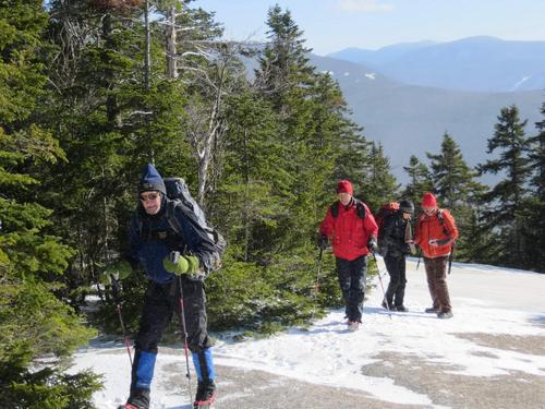 late fall hikers on Mount Pemigewasset in New Hampshire