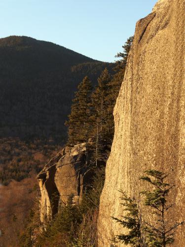 precipitous ledge at sunset in November on Mount Pemigewasset in New Hampshire