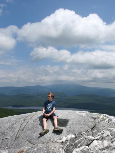 hiker atop Piermont Mountain in western New Hampshire