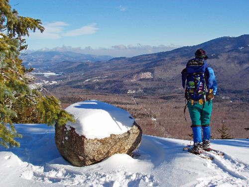 hiker and view from Pine Mountain in New Hampshire