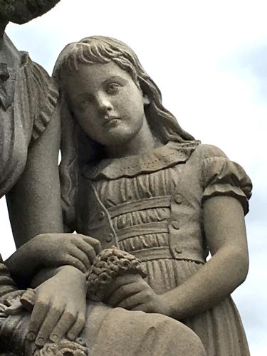 daughte-with-mother statue at Pine Grove Cemetery in Manchester, NH