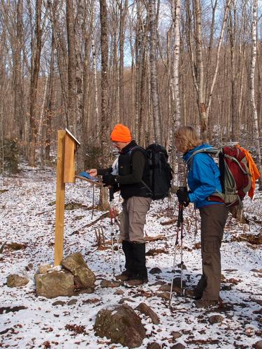 hikers checking in at the South Trail register to Mount Pisgah in Vermont