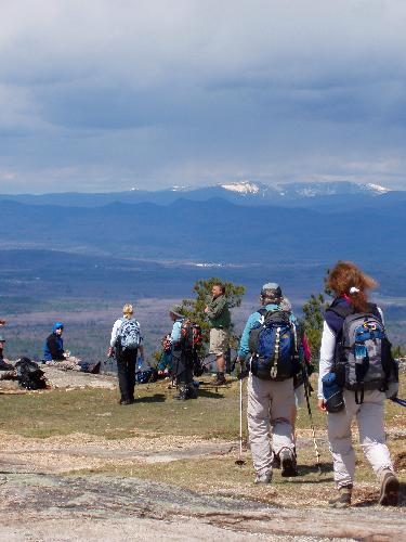 hikers and view from Pleasant Mountain in Maine